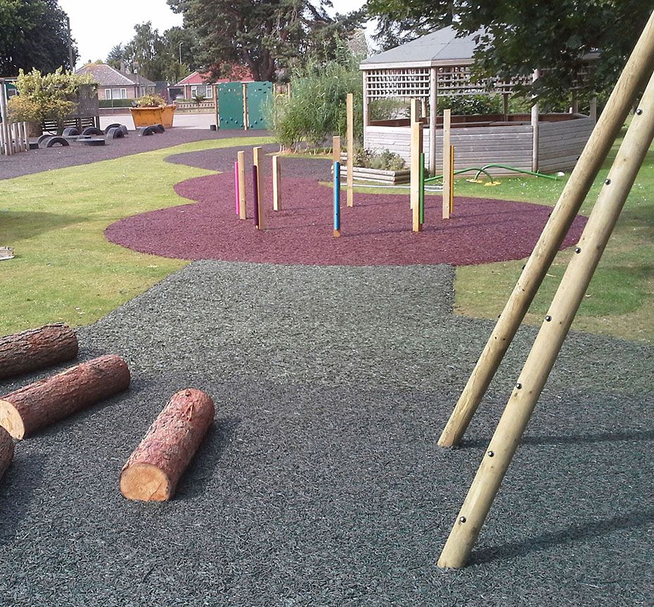 Coloured Rubber Mulch on Grass